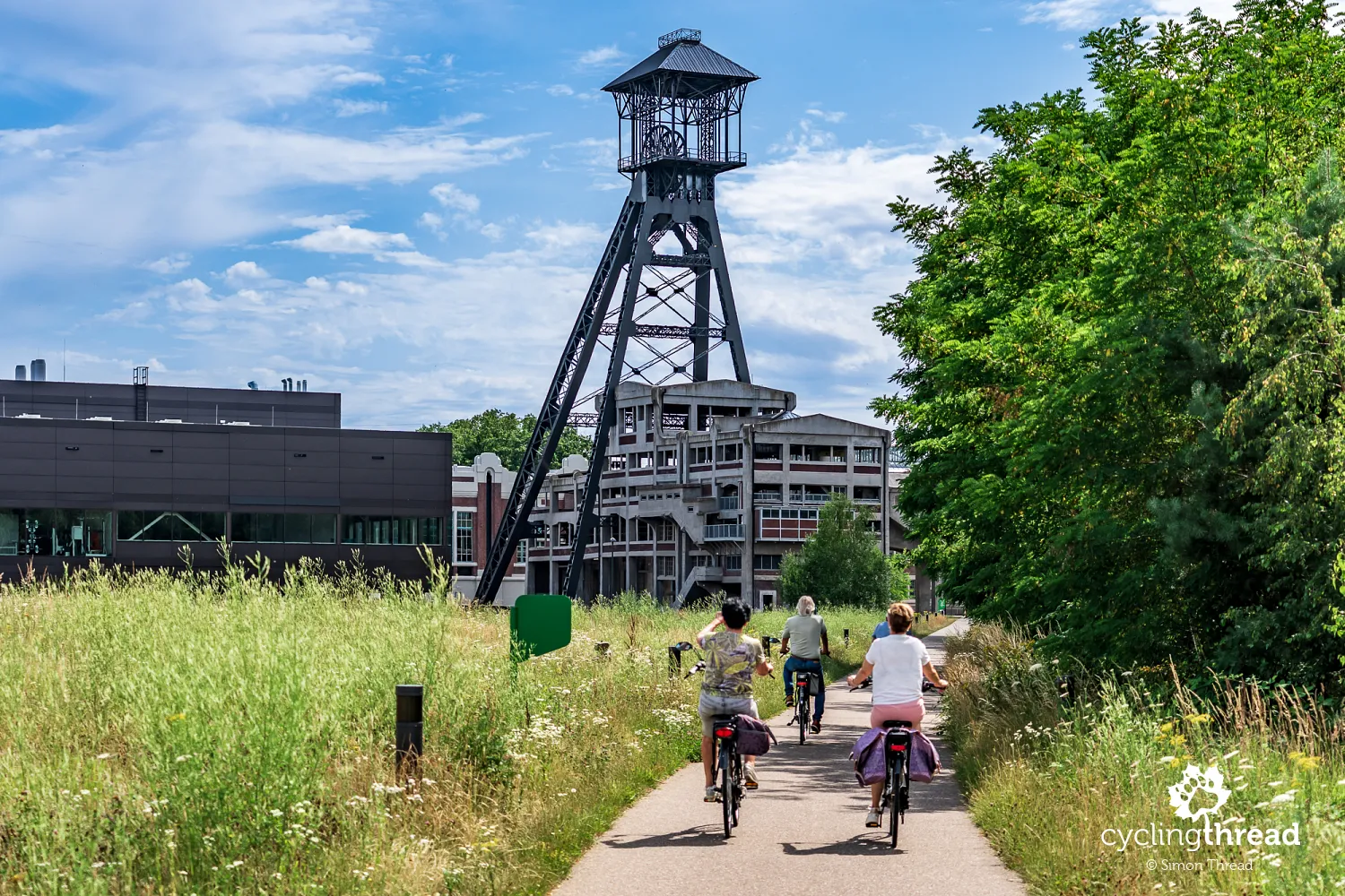 Cyclists in the former Waterschei coal mine