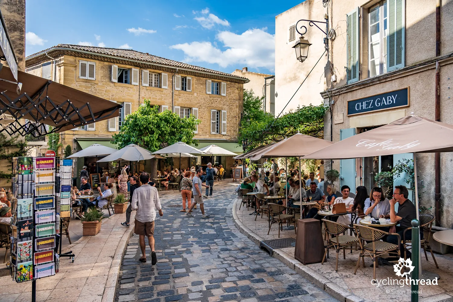 A restaurant on a cobbled street in Lourmarin